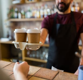 man-or-bartender-serving-cusgdftomer-at-coffee-shop-PCPS887